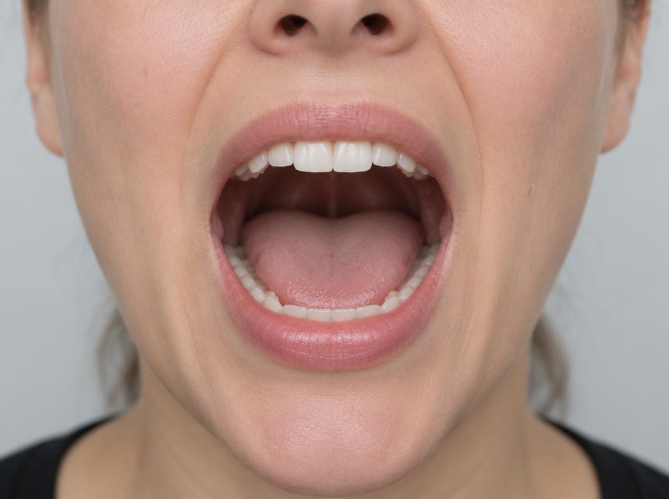 Real mouth position for a, with the tongue resting low